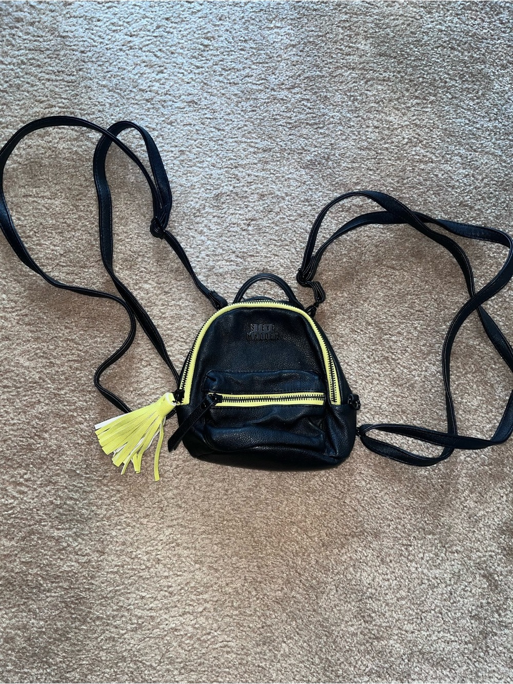 Steve Madden Mini Black Backpack with Neon green trim and tassel